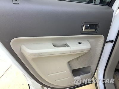 Zdjęcie 32 z 35 samochodu: 2010 FORD EDGE LIMITED VIN:2FMDK3KC9ABB39818 - miniatura