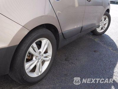 Zdjęcie 10 z 30 samochodu: 2012 HYUNDAI TUCSON GLS VIN:KM8JU3AC5CU422583 - miniatura