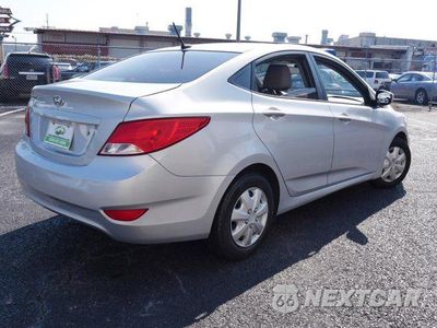 Piąte zdjęcie samochodu w środku: 2016 HYUNDAI ACCENT SE VIN:KMHCT4AE7GU999477 - miniatura