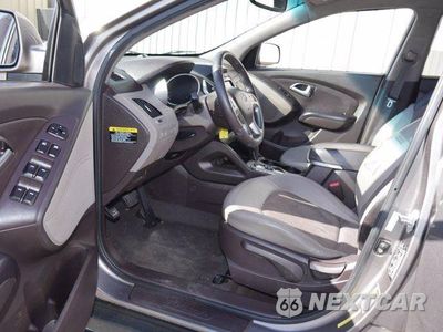 Zdjęcie 16 z 30 samochodu: 2012 HYUNDAI TUCSON GLS VIN:KM8JU3AC5CU422583 - miniatura
