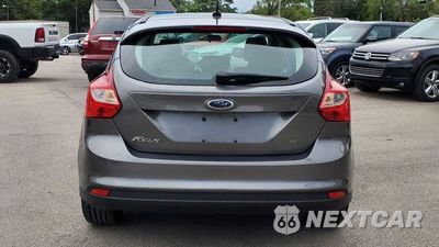 Czwarte zdjęcie samochodu z boku: 2012 FORD FOCUS SE VIN:1FAHP3K26CL305462 - miniatura