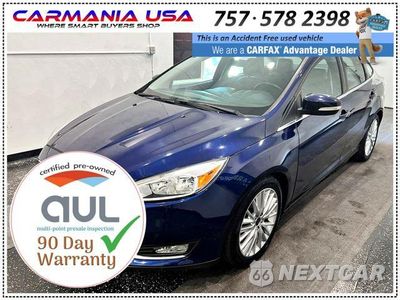 Trzecie zdjęcie samochodu z tyłu: 2016 FORD FOCUS TITANIUM VIN:1FADP3J25GL288059 - miniatura
