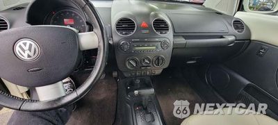 Zdjęcie 13 z 13 samochodu: 2008 VOLKSWAGEN NEW BEETLE TRIPLE WHITE VIN:3VWFW31C78M511066 - miniatura