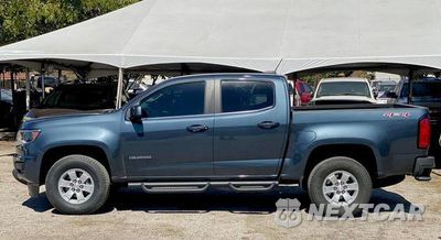 Czwarte zdjęcie samochodu z boku: 2020 CHEVROLET COLORADO VIN:1GCGTBENXL1109814 - miniatura