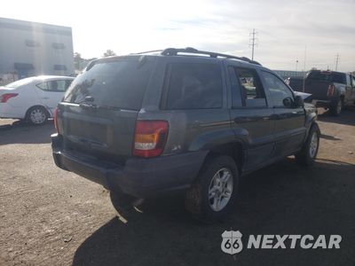 Czwarte zdjęcie samochodu z boku: 2003 JEEP GRAND CHEROKEE LAREDO VIN:1J4GX48SX3C523496 - miniatura