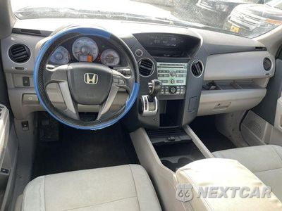 Czwarte zdjęcie samochodu z boku: 2009 HONDA PILOT LX VIN:5FNYF38279B018812 - miniatura