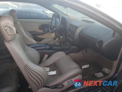 Piąte zdjęcie samochodu w środku: 2002 PONTIAC FIREBIRD TRANS AM VIN:2G2FV32G322150746 - miniatura