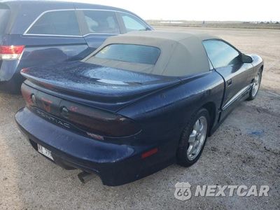 Czwarte zdjęcie samochodu z boku: 2002 PONTIAC FIREBIRD TRANS AM VIN:2G2FV32G322150746 - miniatura