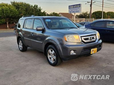 Czwarte zdjęcie samochodu z boku: 2011 HONDA PILOT EXLN VIN:5FNYF3H73BB008991 - miniatura