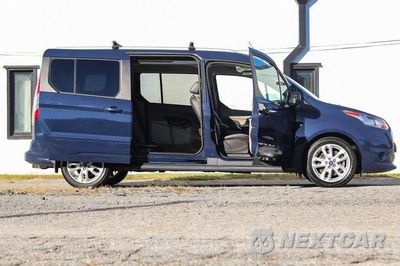 Piąte zdjęcie samochodu w środku: 2016 FORD TRANSIT CONNECT TITANIUM VIN:NM0GE9G74G1285505 - miniatura