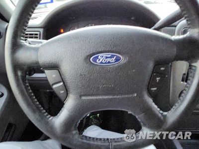 Zdjęcie 28 z 32 samochodu: 2005 FORD EXPLORER XLT VIN:1FMZU63KX5UA19467 - miniatura