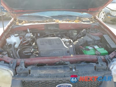 Zdjęcie 7 z 10 samochodu: 2001 FORD ESCAPE VIN:1FMYU01121KC62697 - miniatura