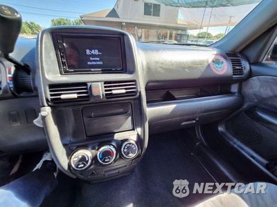 Zdjęcie 23 z 36 samochodu: 2004 HONDA CR-V EX VIN:SHSRD78854U200564 - miniatura