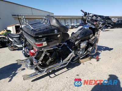 Czwarte zdjęcie samochodu z boku: 2004 HARLEY-DAVIDSON FLHTCUI SHRINE VIN:1HD1FLW184Y600260 - miniatura