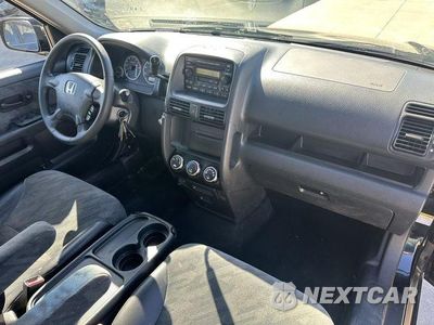 Zdjęcie 18 z 25 samochodu: 2003 HONDA CR-V EX VIN:SHSRD78813U117910 - miniatura