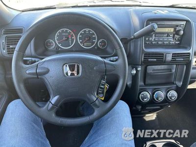 Piąte zdjęcie samochodu w środku: 2003 HONDA CR-V EX VIN:SHSRD78813U117910 - miniatura