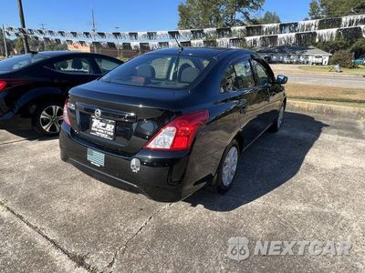Trzecie zdjęcie samochodu z tyłu: 2016 NISSAN VERSA S VIN:3N1CN7AP2GL838971 - miniatura