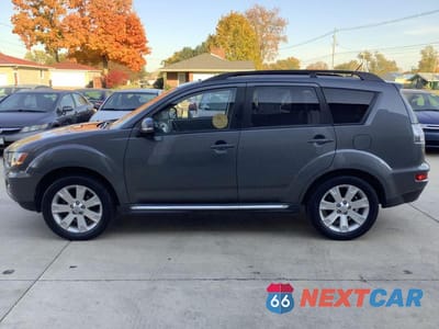 Piąte zdjęcie samochodu w środku: 2011 MITSUBISHI OUTLANDER SE VIN:JA4JT3AW4BU031368 - miniatura