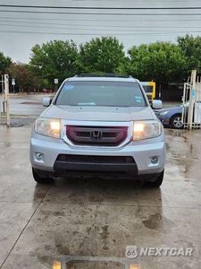 Piąte zdjęcie samochodu w środku: 2011 HONDA PILOT EXL VIN:5FNYF3H63BB008819 - miniatura