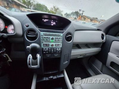 Zdjęcie 28 z 34 samochodu: 2011 HONDA PILOT EXL VIN:5FNYF3H63BB008819 - miniatura
