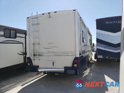 Czwarte zdjęcie samochodu z boku: 2004 WINNEBAGO CLASS A VIN:5B4HP67G243385722 - miniatura