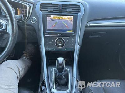 Zdjęcie 40 z 42 samochodu: 2013 FORD FUSION TITANIUM VIN:3FA6P0D96DR126244 - miniatura