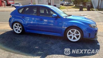 Piąte zdjęcie samochodu w środku: 2010 SUBARU IMPREZA WRX STI VIN:JF1GR8H65AL820026 - miniatura