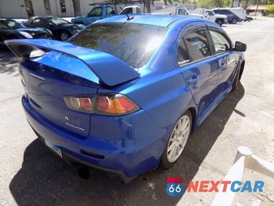 Czwarte zdjęcie samochodu z boku: 2010 MITSUBISHI LANCER EVOLUTION GSR VIN:JA32W8FV4AU019832 - miniatura