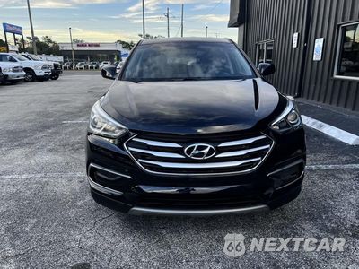 Czwarte zdjęcie samochodu z boku: 2017 HYUNDAI SANTA FE SPORT VIN:5XYZT3LB6HG412703 - miniatura