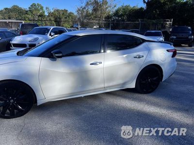 Czwarte zdjęcie samochodu z boku: 2017 NISSAN MAXIMA 3.5S VIN:1N4AA6AP5HC423561 - miniatura