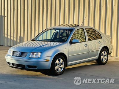 Czwarte zdjęcie samochodu z boku: 2005 VOLKSWAGEN JETTA GLS VIN:3VWSK69M35M025410 - miniatura