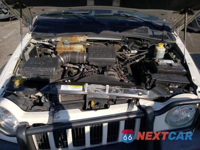 Zdjęcie 7 z 10 samochodu: 2002 JEEP LIBERTY SPORT VIN:1J4GL48K72W187153 - miniatura
