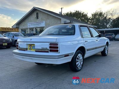 Zdjęcie 14 z 30 samochodu: 1994 OLDSMOBILE CUTLASS CIERA S VIN:1G3AG55M6R6414709 - miniatura