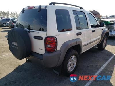 Czwarte zdjęcie samochodu z boku: 2002 JEEP LIBERTY SPORT VIN:1J4GL48K72W187153 - miniatura