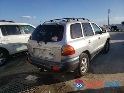 Czwarte zdjęcie samochodu z boku: 2002 HYUNDAI SANTA FE GLS VIN:KM8SC13D02U245599 - miniatura