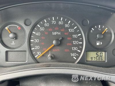 Czwarte zdjęcie samochodu z boku: 2003 FORD FOCUS LX VIN:1FAFP33P93W189075 - miniatura