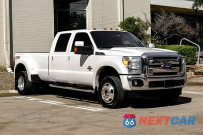 Czwarte zdjęcie samochodu z boku: 2014 FORD F450 SUPER DUTY VIN:1FT8W4DT2EEB34337 - miniatura