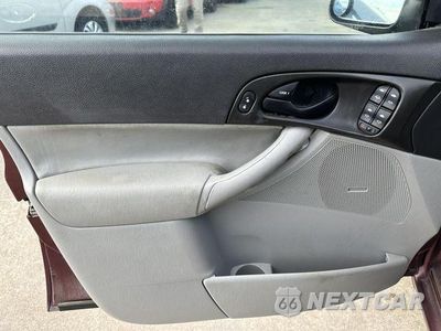 Zdjęcie 14 z 14 samochodu: 2006 FORD FOCUS ZX5 VIN:1FAHP37NX6W160352 - miniatura