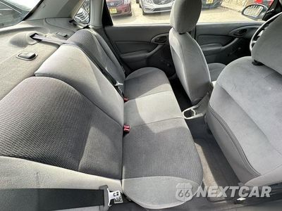 Zdjęcie 16 z 19 samochodu: 2003 FORD FOCUS LX VIN:1FAFP33P93W189075 - miniatura