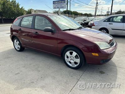 Zdjęcie 12 z 14 samochodu: 2006 FORD FOCUS ZX5 VIN:1FAHP37NX6W160352 - miniatura