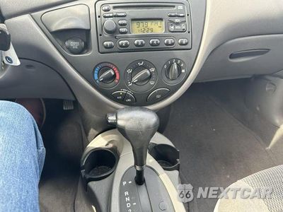 Zdjęcie 17 z 19 samochodu: 2003 FORD FOCUS LX VIN:1FAFP33P93W189075 - miniatura