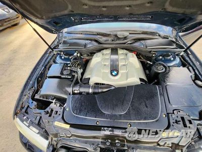 Zdjęcie 21 z 35 samochodu: 2003 BMW 745 I VIN:WBAGL63483DP66351 - miniatura