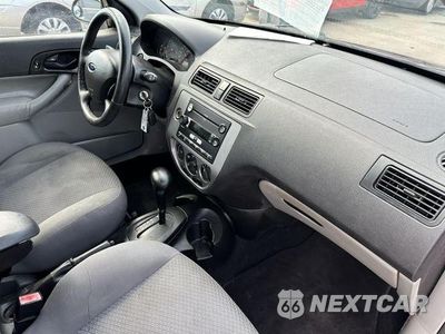 Czwarte zdjęcie samochodu z boku: 2006 FORD FOCUS ZX5 VIN:1FAHP37NX6W160352 - miniatura