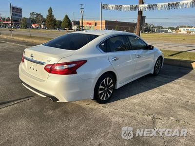 Trzecie zdjęcie samochodu z tyłu: 2016 NISSAN ALTIMA 2.5 VIN:1N4AL3AP0GC260812 - miniatura