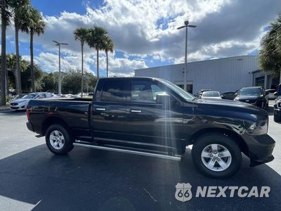 Czwarte zdjęcie samochodu z boku: 2017 RAM 1500 SLT VIN:1C6RR6GG4HS650816 - miniatura