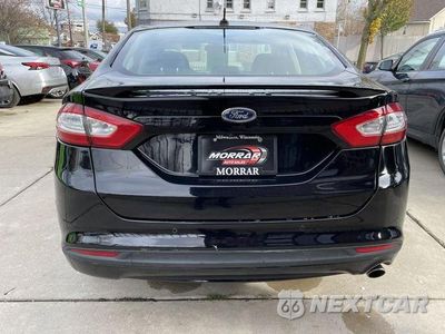 Piąte zdjęcie samochodu w środku: 2016 FORD FUSION SE VIN:3FA6P0H73GR301515 - miniatura