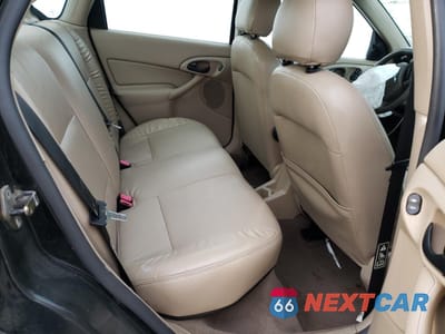 Zdjęcie 10 z 14 samochodu: 2003 FORD FOCUS ZTS VIN:1FAFP38343W311704 - miniatura