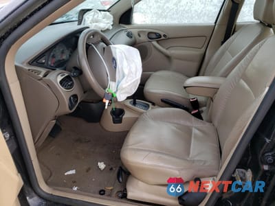 Zdjęcie 7 z 14 samochodu: 2003 FORD FOCUS ZTS VIN:1FAFP38343W311704 - miniatura