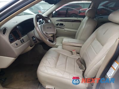 Zdjęcie 7 z 13 samochodu: 2001 LINCOLN TOWN CAR EXECUTIVE VIN:1LNHM81W91Y733042 - miniatura