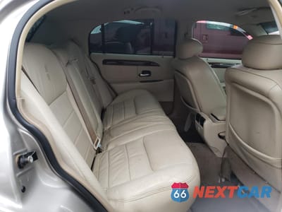 Zdjęcie 10 z 13 samochodu: 2001 LINCOLN TOWN CAR EXECUTIVE VIN:1LNHM81W91Y733042 - miniatura